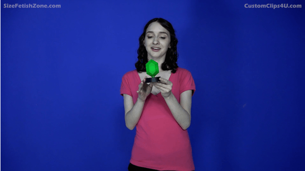 starts with a growth scene. If possible I would then like a second growth scene where she grows to mega size, as I've seen you do in many other videos, and briefly destroys some of the smaller cities. Here's my storyline pitch: I want the video to be about a microphile (a woman who gets off on tiny people, the reverse of our fetish, so basically someone who already wanted to be a giantess) but someone who is ashamed about it, and doesn't want to give in to their worst impulses once she's giant-sized. 
<br><br>
Girl finds an ancient magic talisman. The talisman is said to bring out your deepest desires and make them reality. She picks it up but then thinks about what that actually means for her, and then tries to throw it down because she realizes what that means. It's too late, she starts growing. She should be VERY into the growing as it's happening, losing herself in it almost euphorically.
<br><br>
2. Girl is now giantess-sized. This is where I want her to be extremely conflicted at first. Again, this would require someone who can act and maybe someone who's somewhat of a "girl next door" type, as that's what I'm envisioning in my mind. Someone who you wouldn't guess has a giantess fetish, in another words, who you'd think of as a "nice girl" or "shy girl", but it's her dark secret. She doesn't want to hurt anyone at first but as she keeps looking down at the tiny people she's getting more and more turned on. Slowly, she can't help herself. She starts picking them up but still doesn't want to hurt them. Finally she gives in and pops one in her mouth, and she should react almost like she's having an orgasm.
<br><br>
3. Now that she's given in to her impulses she should steadily lose control and start doing the typical giantess things. She should keep apologizing to them, sincerely not in an evil laughing way, but keep being unable to stop herself from stepping on them, eating them, all the typical stuff you always do in your videos!
<br><br>
4. I would love one of those scenes you used to do a lot with the "she makes the guys rub her feet" type deal, but instead of being like malicious and laughing at them, she acts like she's embarrassed about it. She picks up a couple guys and she's like "Can you....can you rub my feet?", very awkwardly and shyly, but when one of them tries to get away she does pound her first down and go "Hey! I am a lot bigger than you you know! Don't make me hurt you!". Whereas normally you shoot these scenes where the giantess is unimpressed by their efforts, here I want her to be positively orgasmic about it again. Their little hands on her enormous feet turn her on so bad she can barely stand it. Finally she keeps looking at them, staring at them doing it, and she can't help herself, she crushes them under her feet and gets off on it in a big way.
<br><br>
5. She finally starts destroying buildings with her body and really gets off on it, again very similar to videos I've seen you do a million times. Although honestly, I don't need a lot of this- maybe like two buildings or something. After she finishes destroying one, she suddenly feels funny and realizes she's about to grow again. She should be in a mixture of orgasmic pleasure and also again feel bad about it- be panting and into it but at the same time say something like "no....these little people won't stand a chance...."
<br><br>
6. She's now mega-sized. She should once again briefly be hesitant, saying something like "No...I'll crush so many people now....I can't do this." but then when she stares down at the tiny cities she gives in and starts crushing them. It should definitely be much faster than when she was hesitant earlier since she's already given in the first time. I don't need a lot of footage here either, but just a few shots of her destroying tiny cities with her feet is good. And then that's the end. Hopefully this all made sense! So again, to recap what I'm looking for: "girl next door/shy nice guy" type has secret giantess fetish, turns into giantess, is both really into it but also actually feels bad for the tiny people and doesn't want to give in at first, then gives in. 