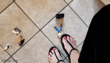 Madam steps on and crushes a number of tiny victims, wearing her Pulp Fiction outfit and black flip flops.  This clip is seen from HER perspective from a standard POV angle.  Separate clip will show a VR version from YOUR perspective.
