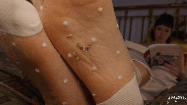 Late at night, a group of tiny people scurry and scour around Syra Wolf’s kitchen looking for food. Little do they know, Syra Wolf is not asleep, but rather, attempting to unwind with a book and some tea. However, Syra is rudely interrupted by notification after notification, an automated alarm that triggers whenever there is movement on the floor nearby one of the traps Syra has set to catch those troublesome tiny people. 

Annoyed but undeterred, Syra does their best to relax until they hear a crash in the other room. Getting up to inspect the noise, Syra quickly discovers there are tiny people all over the kitchen. Without hesitation or a second thought, Syra rids the kitchen of the unwanted guests.   

Upon further inspection, Syra notices one of the traps is full. Returning to the bed with their prize in hand, Syra introduces the tiny people to a new trap, the inside of a sock. Finally, Syra can read in peace.

Contains: Booms/Shakes, Aware, POV, Barefoot Crush, Hand Crush, Socks, Entrapment, No Dialogue