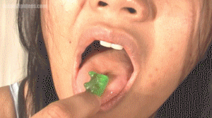 Jealous because a few guys wouldn't date her, Tenshi has turned her friends into jelly people. Tight close-up views capture the action as Tenshi's saliva gushes up around them and her teeth. She growls, chews, and swallows them down, showing off the back of her throat to those remaining. Tenshi is completely delighted in this video and enjoys making them her prey. The views in this one are wonderful as she licks her lips and eats them up. Includes two short bonus views at the end, showing more open mouth.

