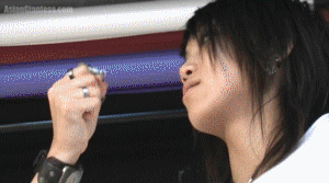 A shrunken man is held in Decode's as she demands to know where he's from. Saying nothing Decode finally gets fed up and decides to sit on him to try to get some answers out of him. He remains uncooperative and is sat on a few times before she finally squishes him under her butt. A mix of handheld and booty crush.
