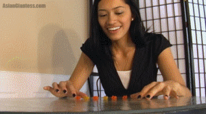 Melanie's friends have done bad things to her and now she has them all shrunken down. She tells a few short stories before popping some of them in, but the real focus of this one is lots of nice close up chewing scenes with Melanie opening wide between bites. She chews up all of them, this is a hard vore video. The video includes a few short throat views as she swallows what's left of a few of them, and lots of nice sounds and dialogue from Melanie. No extra lighting was used in this one, but as you can see from the preview pictures, Melanie's mouth closeups are quite visible.
