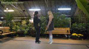 Chibi has hired a new model named Lisa and is disapointed when she shows up for her shoot and she's quite a bit shorter than she was supposed to be. Lisa assures him that she can grow, and it turns out she just needed to wait for her serum to kick in. She has a short growth spurt that makes her grow to 6`4``! This is Lisa's actual height (in real life) and Chibi walks around her, stands next to her, and generally is surprised she's so tall. Even without her boots on she's taller than him.
