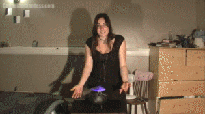 Witchy offers to help you by casting a protection spell on you that will help you at work. Curious you decide to let her but when she casts it you suddenly shrink down pretty quickly. You end up staring up at Witchy as she sits on her bed, holding a socked foot over you and trying to convince you that you shouldn't be afraid. She eventually takes them off and teases you with her bare feet, telling you it's just a foot as she holds it over you. Finally she convinces you to come closer with her feet on the floor and thats when she decides to squish you with one quick step.
