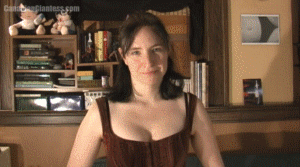 Karen thinks her and Aleksandra (AKA Pixxi) are drifting apart, and Aleks doesn't want that. So she shrinks her friend down which takes just under a minute, and then invites her into Alek's giant hands to be placed on the couch. After debating what to do, Aleks invites Karen to wander up and sit in her cleavage. In the end Aleks holds Karen in her hands and closes her hands around her.
