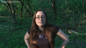 Witchy catches you out in her woods and decides to shrink you down. You thought it was just a public trail but before long you're shrunken down at Witchy's sandaled feet. She keeps telling you off for trespassing and threatens to squish you. Witchy comments that she doesn't think it would be satisfying with her sandals on, so she takes one off and threatens you some more. You try to suck up to her but in the end you're stepped on.
