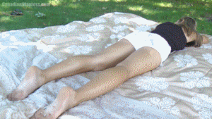 While resting in the park, Adrianna unknowingly has some tiny people crawling on her feet. Too tired to find out what is bothering her, she just uses her beautiful foot to poke at what's on the sole of her other foot. A few have found their way into her palm too and just the same Adrianna rests as she carelessly pokes away at the tiny people in her hand and ultimately ends up squishing them in the squeezing pressure of her closed fist. Finally she does wake up and notices a few on her blanket still. Some of them are picked up and squished in her hands, others end up getting stomped on. In a short scene at the end Adrianna peacefully lays back down and goes back to resting giving the tiny people she just squished no more thought.
