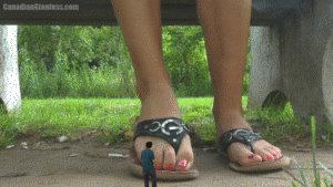 Our first special FX video in a long time! This story features Adrianna's ex Derek. He was always really loved her feet as well as her and this video tells a violent story and a gentle story about what could happen if Adrianna had shrunk her ex. In the first violent outcome, Derek finds himself on the ground before his ex's sandaled feet as her echoing voice taunts him figuring he should be happy to be this close to them. After more teasing and taking off her sandals Derek ends up squished after a short cry and you hear him squelch under her foot. A short advanced slow-mo scene retells the squish which really shows off the power of Adrianna's stomp. Next you get the see the gentle outcome of Derek's fate. He finds himself on a coffee table at Adrianna's huge soles after she's had a hard day at work. She asks for a massage and Derek is only too eager to do it! In the end she even considers him being her boyfriend so she can have a massage like this every day she enjoys it so much. Two completely different fates, all decided by Adrianna loving or hating her ex's desires for her feet. Just to note, the POV in the squish story has a pretty dirty lense otherwise the video is clear. 6min 43sec.
