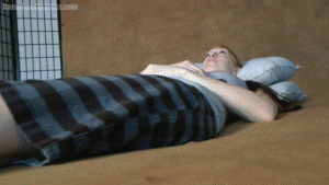 You're a tiny person on a bed down by Lauren's feet. Eager to explore her you hop up on Lauren's leg. Unfortunately she notices you right away and seems fed up with finding tiny people. Her voice echoes high above you as she tells you that. Frightened you stare up at Lauren as she comes to the conclusion that it would be best just to squish you underfoot. In the end you find yourself under her toes and eventually they bear down on you as everything fades out. Most of the focus in this one is on Lauren as she plans to squish you, but there are also some detailed views of her feet highlighted at the end in slow motion with over thirty second added bonus footage.
