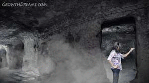 Tara is looking in a cave for an ancient spell and she finds it written on a wall. She only reads part of it when she grows, Turns out the feds were following her and they were ready and they capture the Giant Tara and later after she has returned to normal size she wakes in a cell but luckily she remembers everything that was on the wall and speaks the second part of the spell and grows again and escapes.  Later after shrinking back again she writes down the complete spell and reads out the last part and grows permanently. 
