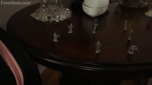 Vivian is lying in the couch and an army attacks but she is hungry so she welcomes the attack. and they satisfy her fully. 
